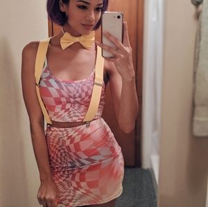 Yellow suspenders and bowtie.